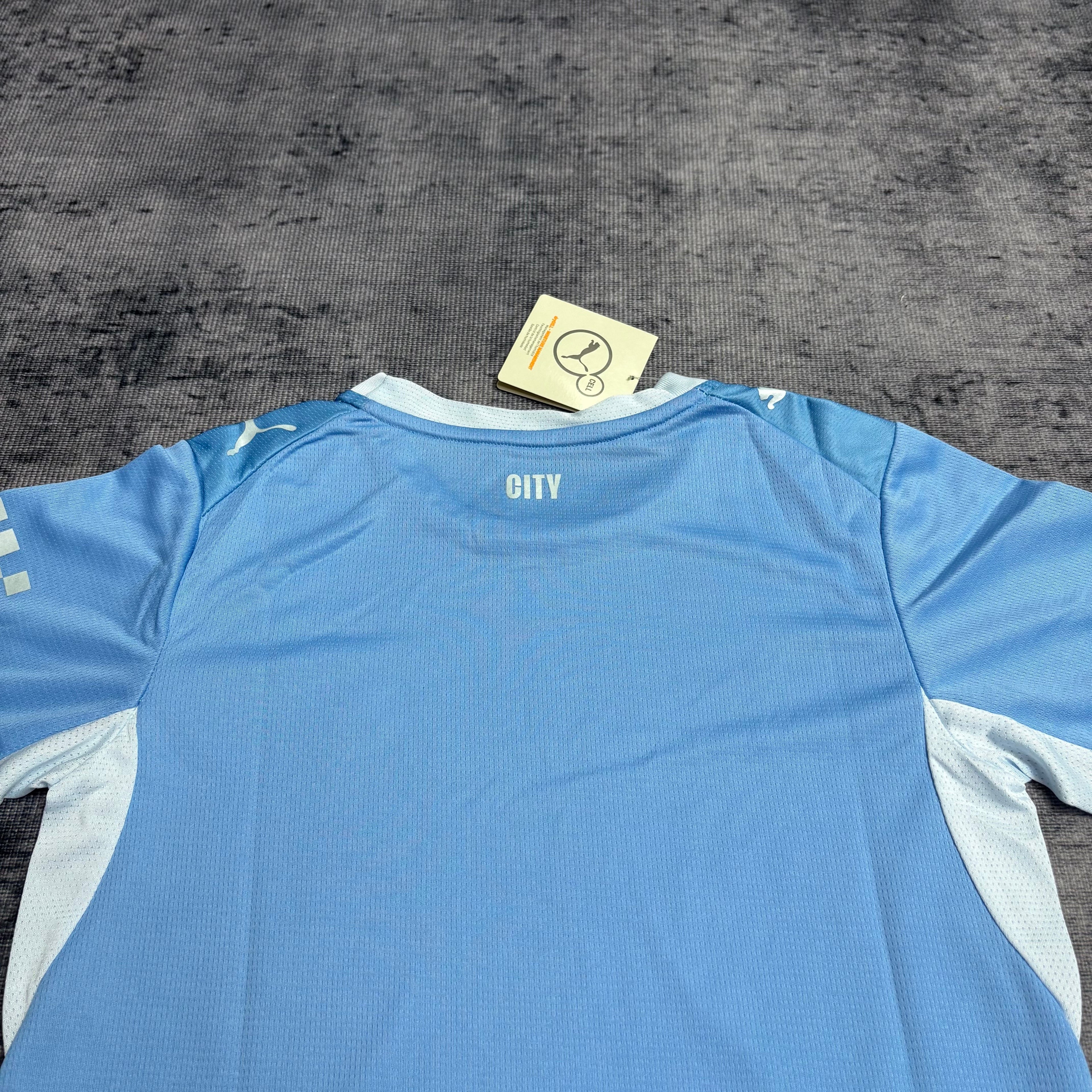 Conjunto Infantil Manchester City local 2026 azul