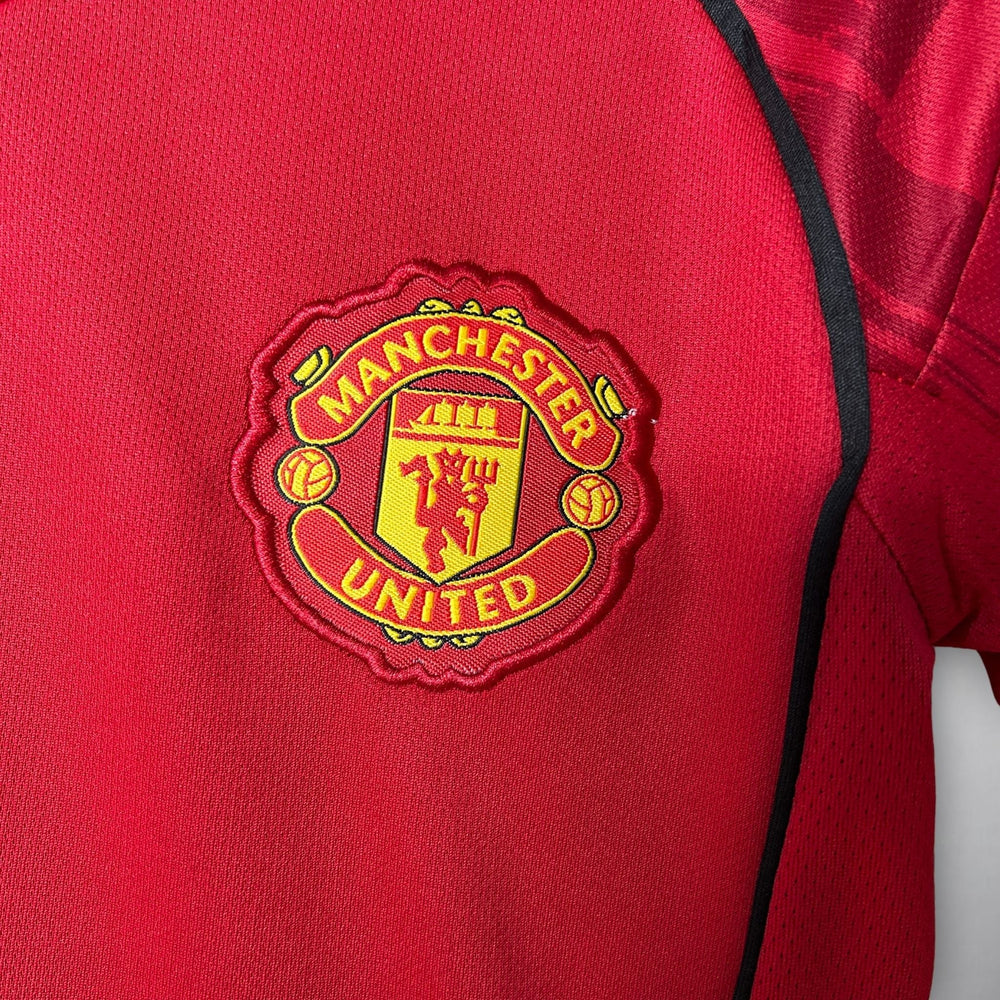 Conjunto Infantil Manchester United local 2025/26