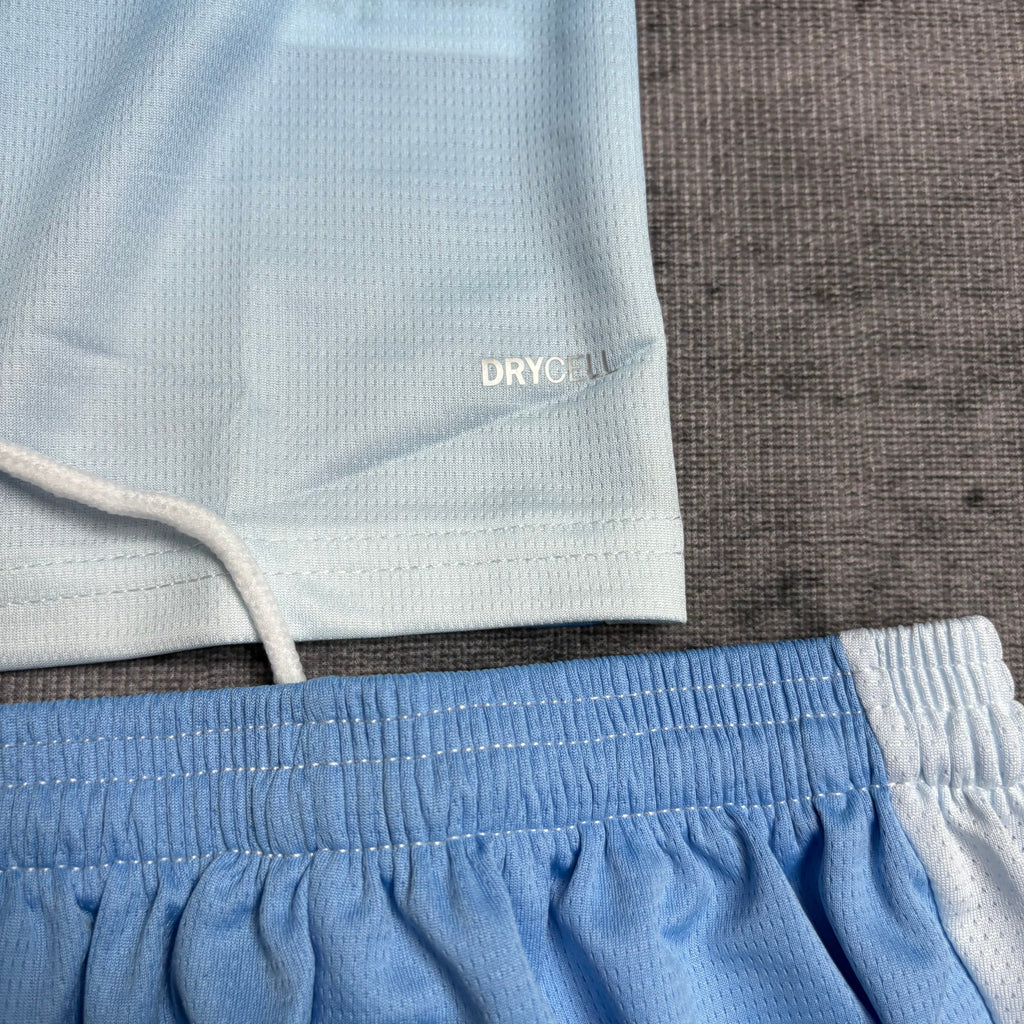 Conjunto Infantil Manchester City local 2026 azul