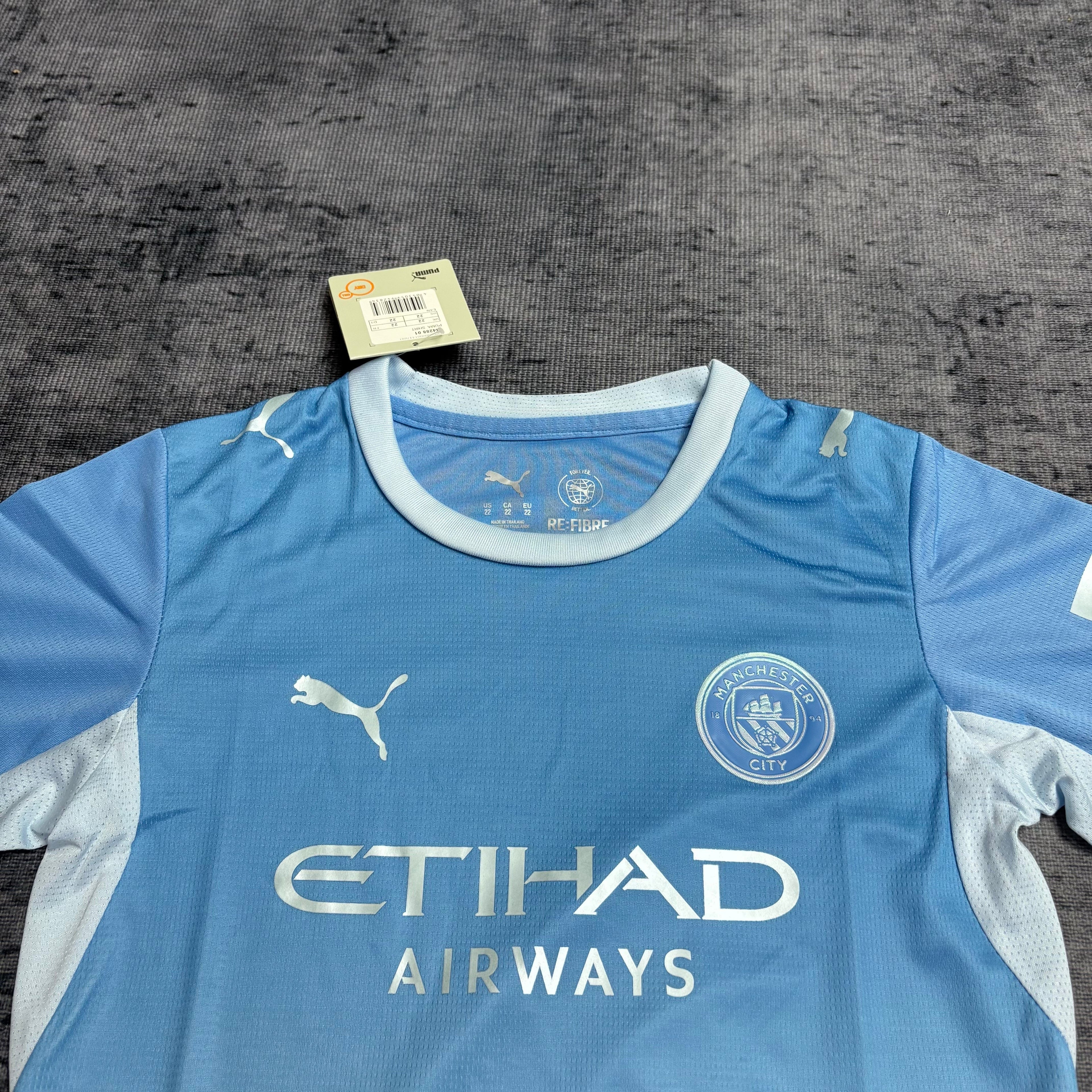 Conjunto Infantil Manchester City local 2026 azul