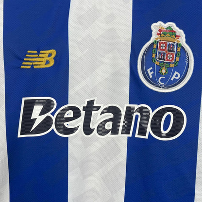 Camiseta primeiro equipación azul/blanco 2025/26 síbolo bordado