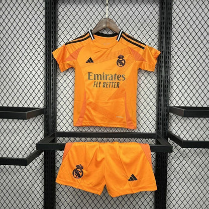 Conjunto Infantil Real Madrid away naranja 2024/25