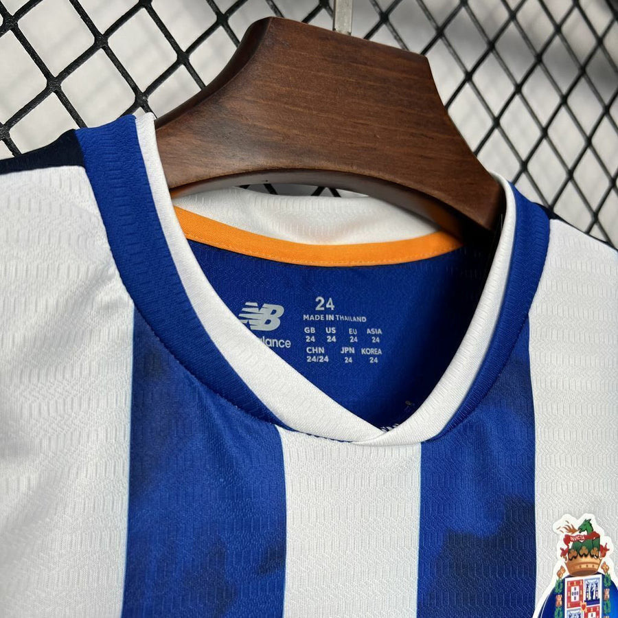 Conjunto infantil principal azul y blanco 2024/25