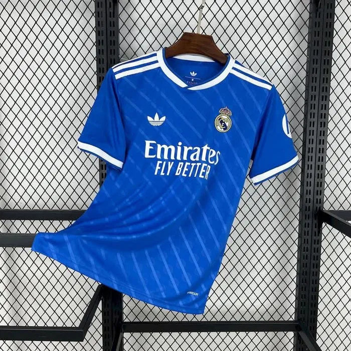 Camiseta Real Madrid tercera equipación azul 2025/26