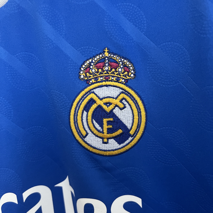 Camiseta Real Madrid tercera equipación azul 2025/26