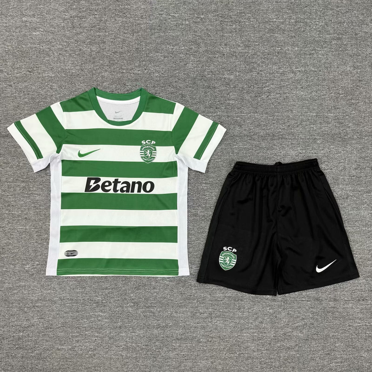 Conjunto infantil BICAMPEÓN principal 2025/26