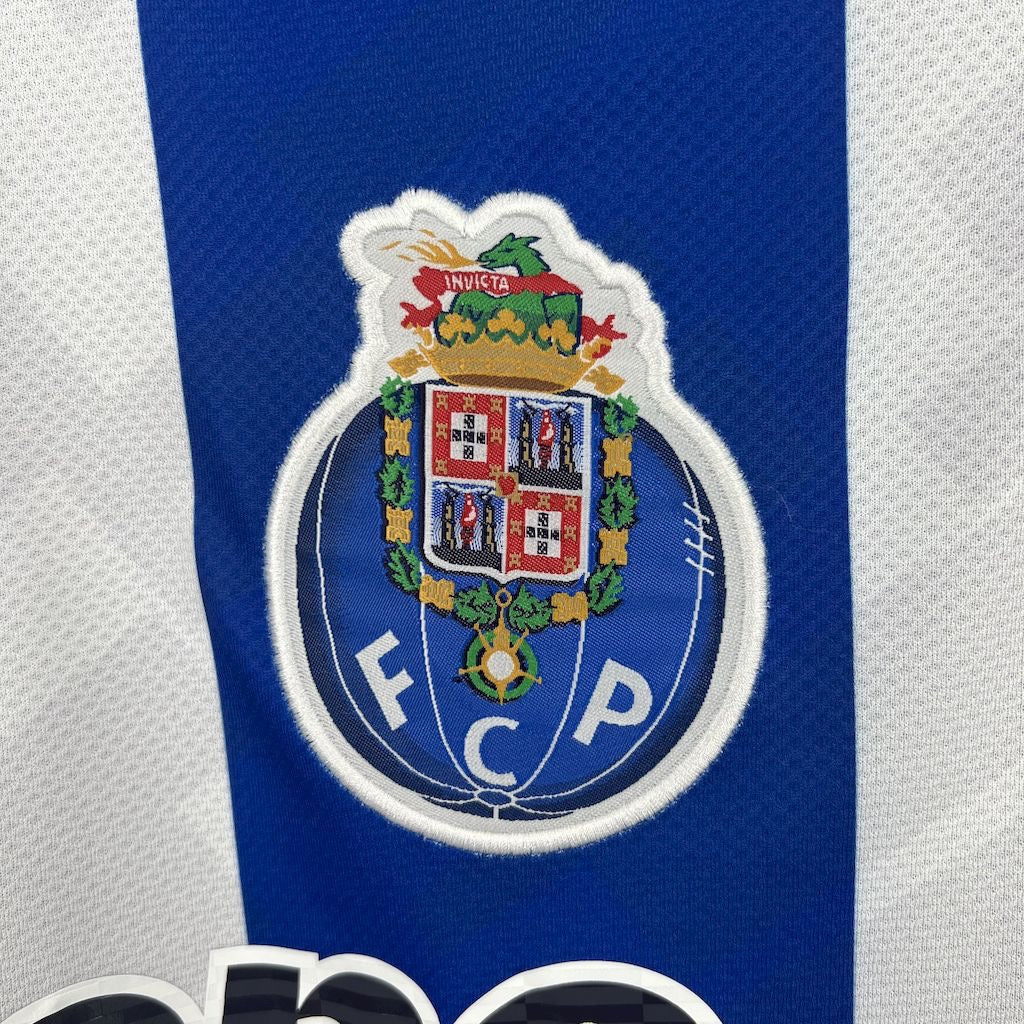 Camiseta primeiro equipación azul/blanco 2025/26 síbolo bordado