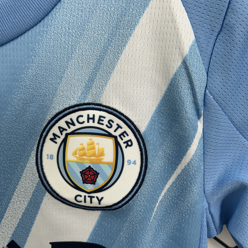 Conjunto Infantil Manchester City local 2025/26 azul