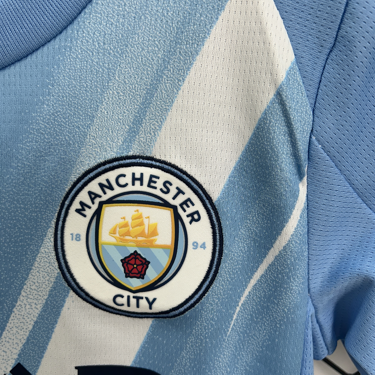 Conjunto Infantil Manchester City local 2025/26 azul