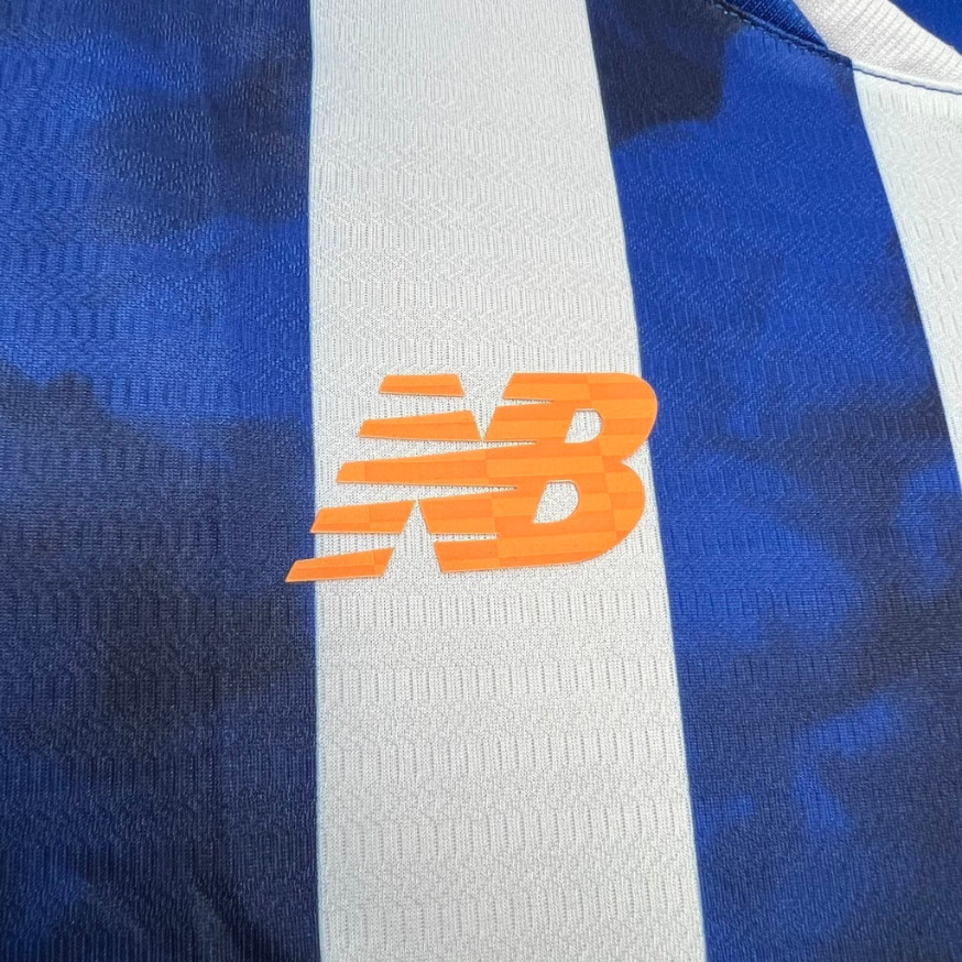 Camiseta primeiro equipación azul/blanco 2024/25