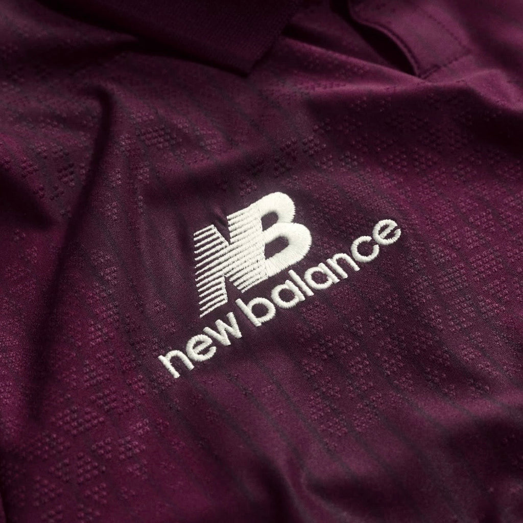 Camiseta dragón ALTERNATIVA 2026/27 rubi secundario