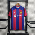 Camiseta Barcelona azul/roja Local 2023/24